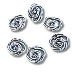 Silver-Colored Flower-Shaped Buttons