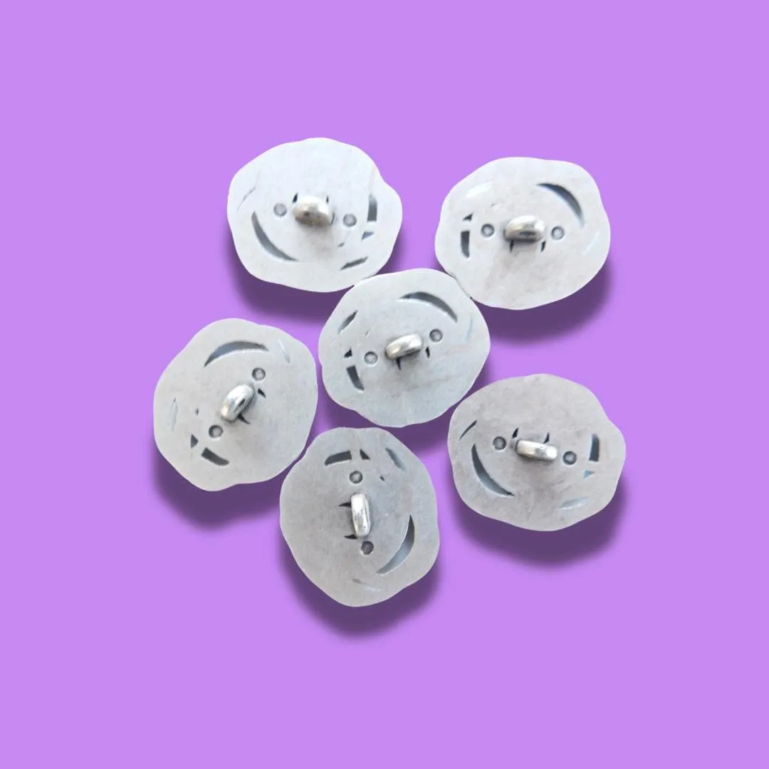 Silver-Colored Flower-Shaped Buttons